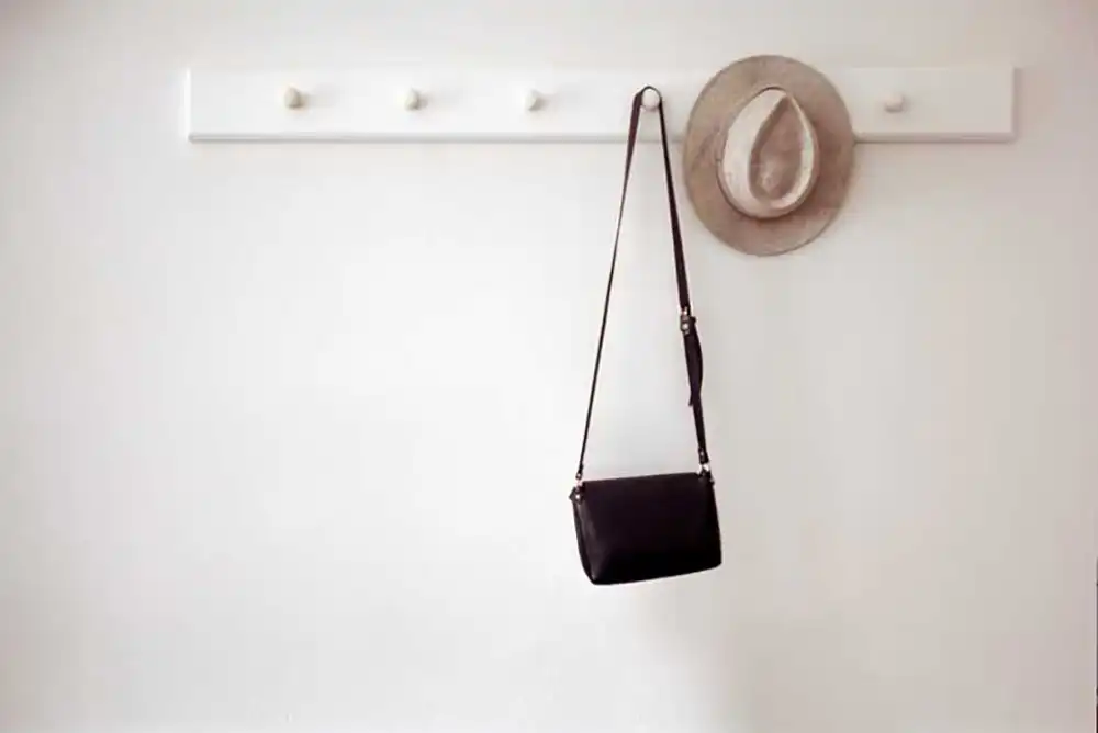 hang purses with hooks to show them off