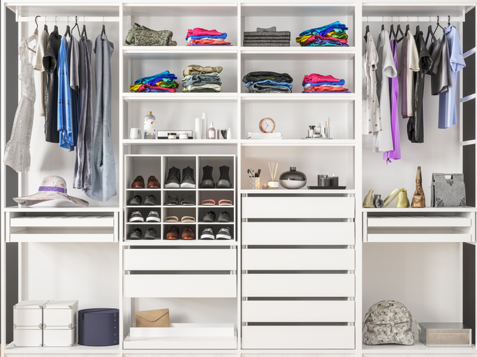 A tidy closet with hanging areas and shelves DIY Master Bedroom Makeover Ideas on a Budget