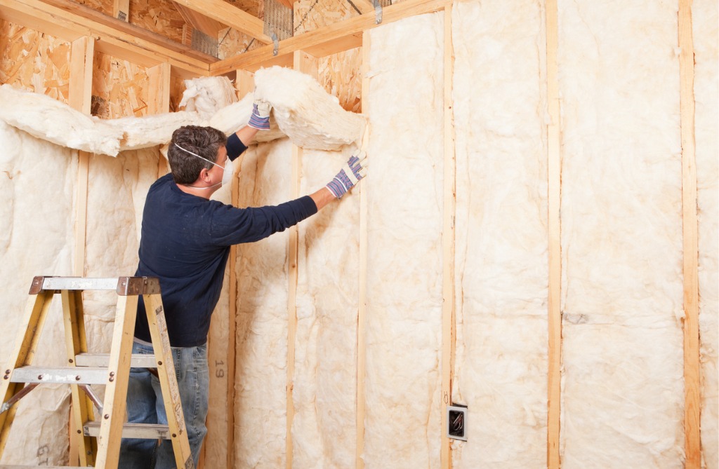 shipping container homeowners insulating their home